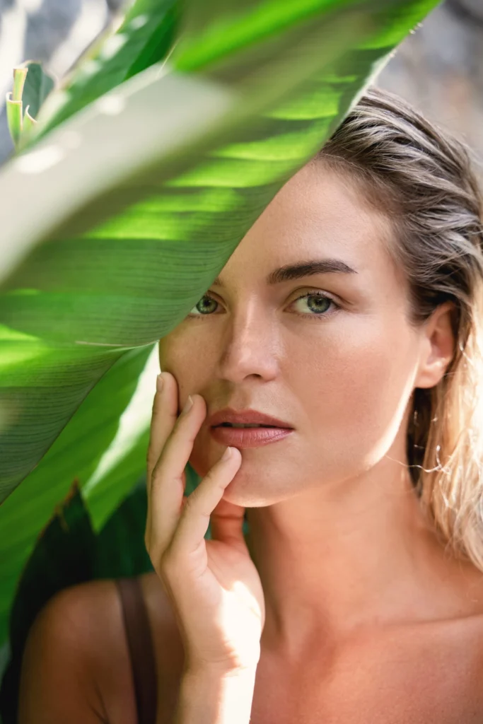 beautiful-natural-looking-woman-with-tropical-banana-leaves-scaled-1